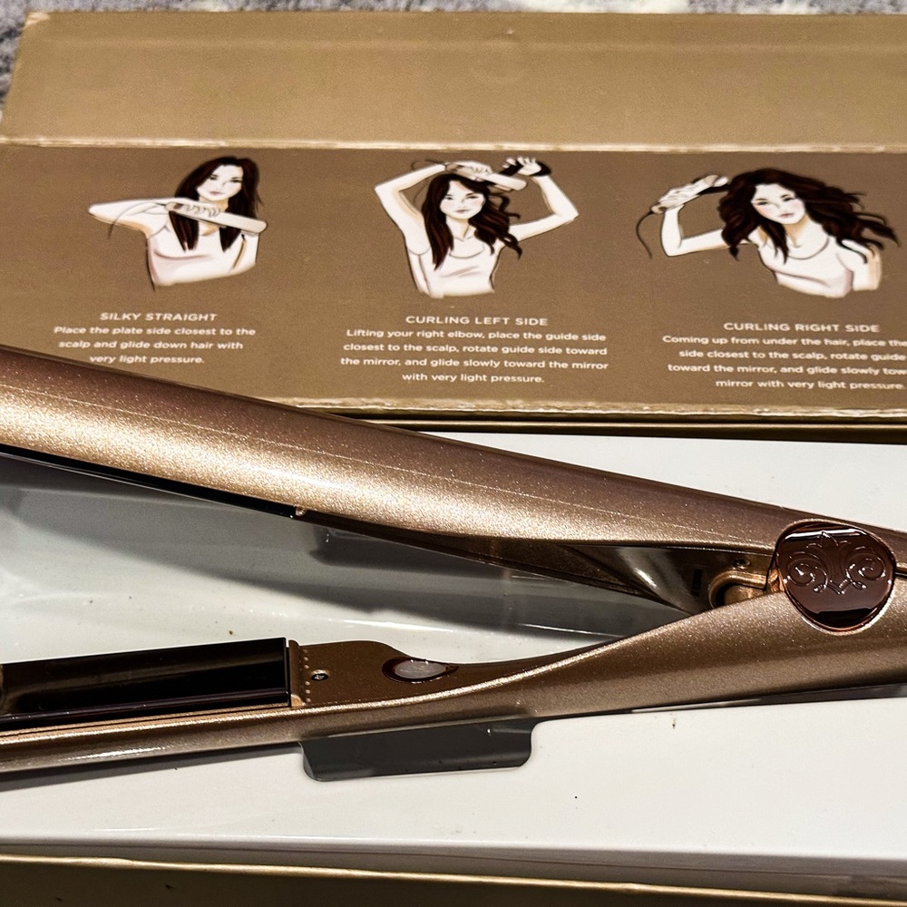 Tyme pro hair straightener and curling iron in one. Brand new never used